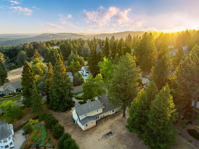 a view of a city with mountains in background