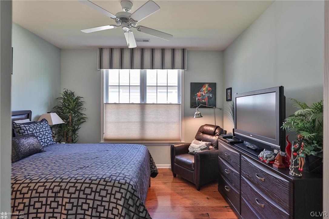 1015 Declaration Drive Bethlehem, PA 18017 - Photo 11 of 33 a bedroom with a bed and a flat screen tv