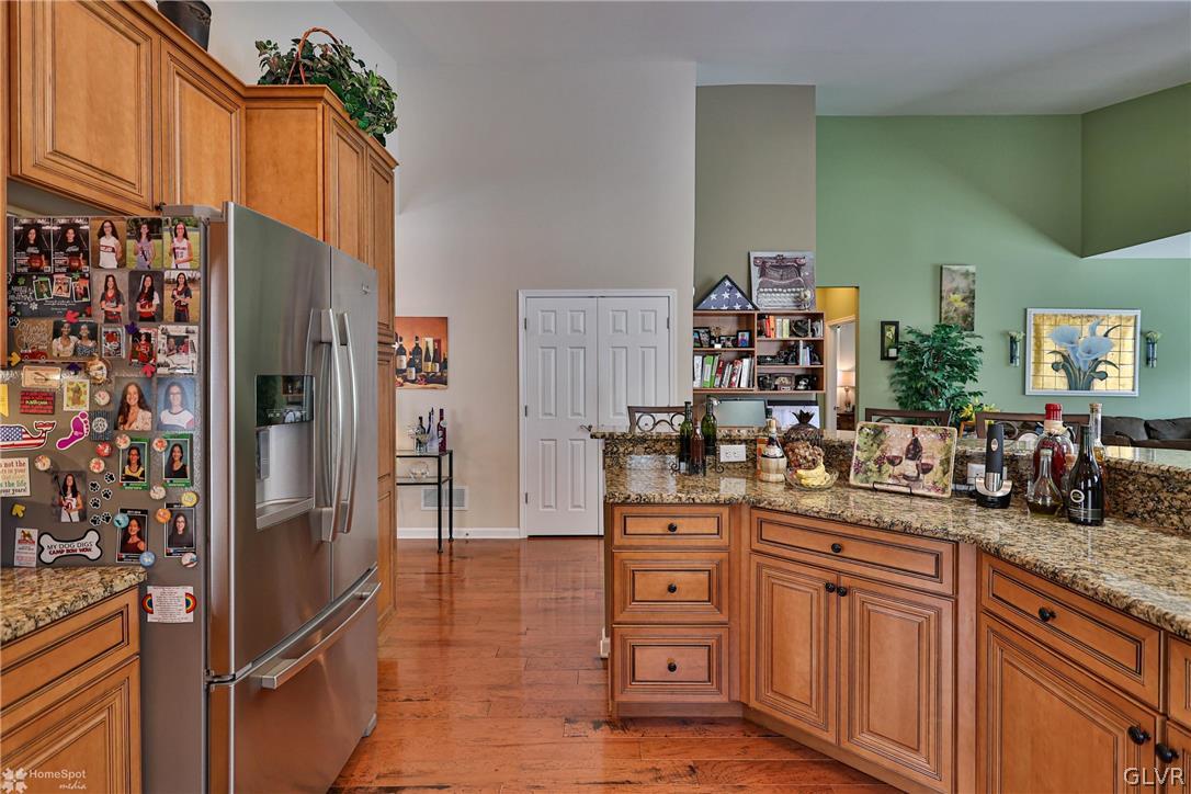 1015 Declaration Drive Bethlehem, PA 18017 - Photo 15 of 33 a kitchen with granite countertop a refrigerator and cabinets