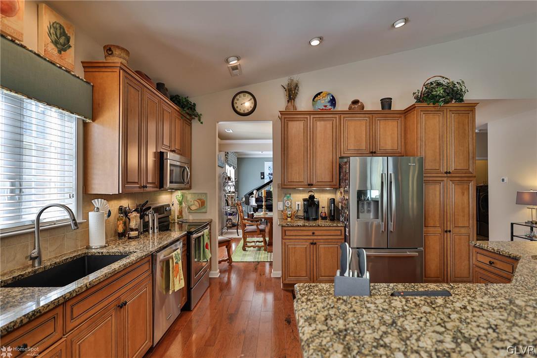 1015 Declaration Drive Bethlehem, PA 18017 - Photo 16 of 33 a kitchen with refrigerator and cabinets