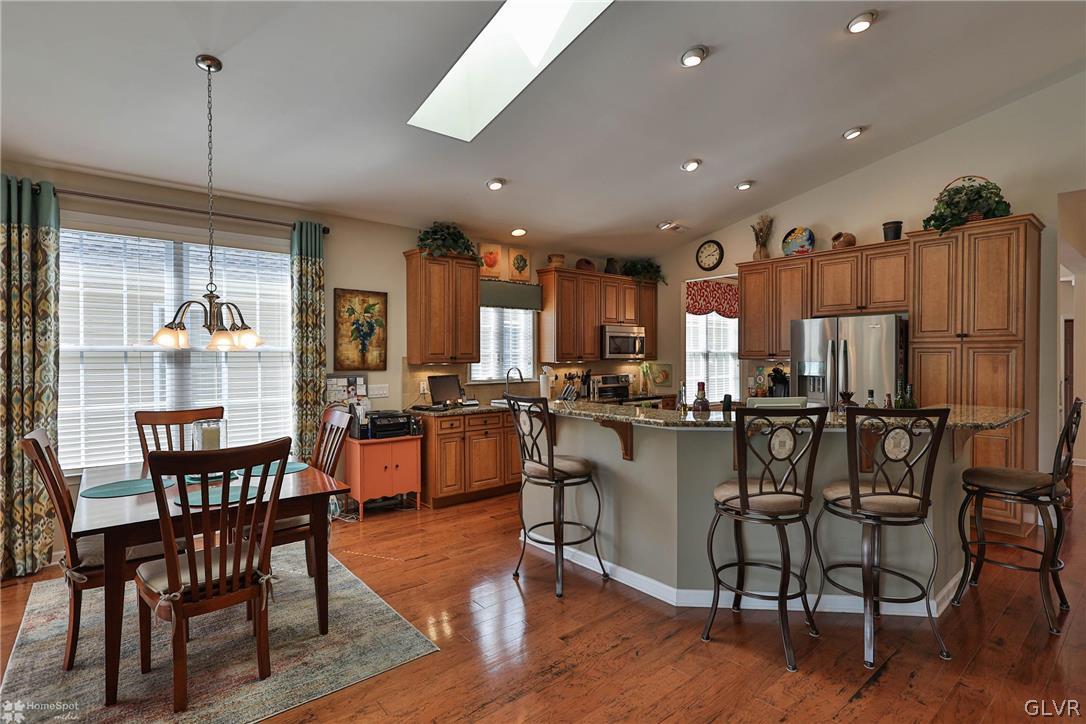 1015 Declaration Drive Bethlehem, PA 18017 - Photo 17 of 33 a view of a dining room with furniture window and wooden floor