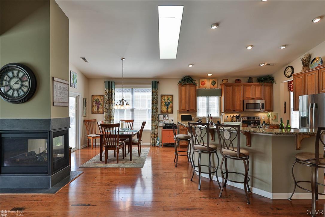 1015 Declaration Drive Bethlehem, PA 18017 - Photo 18 of 33 a view of a dining room with furniture window and wooden floor