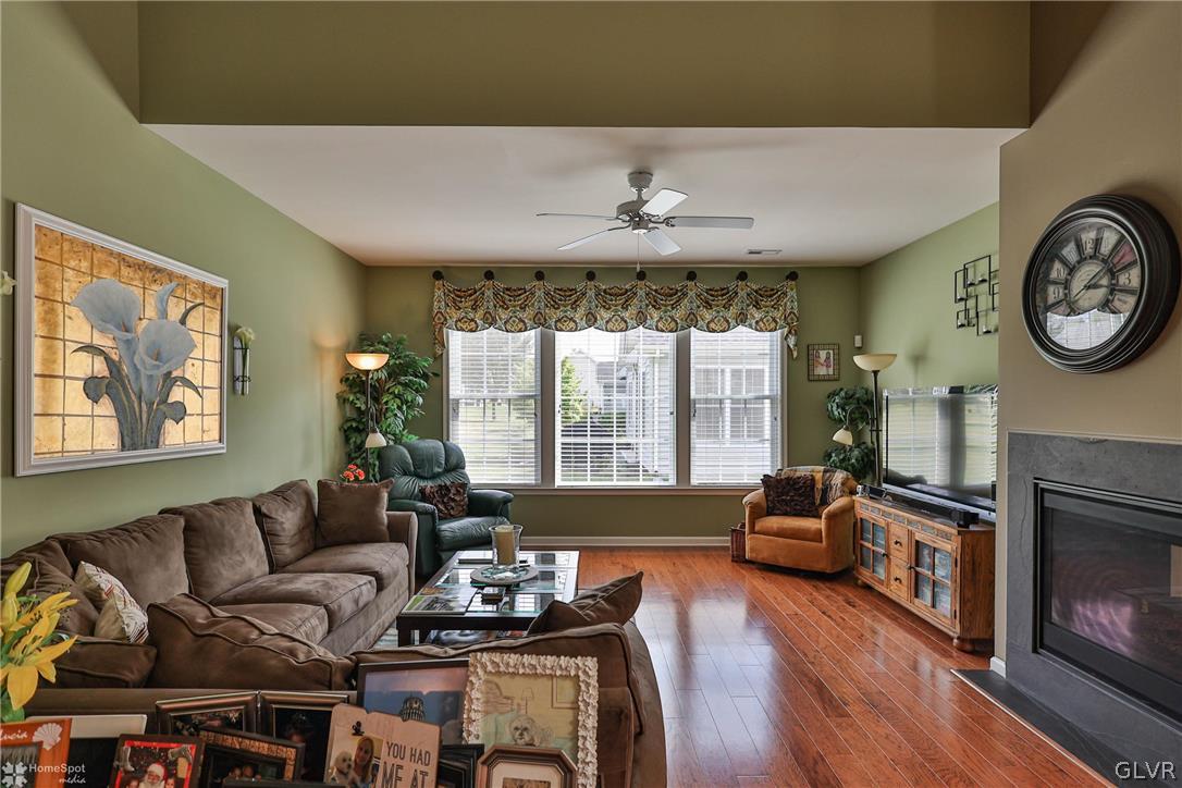 1015 Declaration Drive Bethlehem, PA 18017 - Photo 22 of 33 a living room with furniture a fireplace and a large window