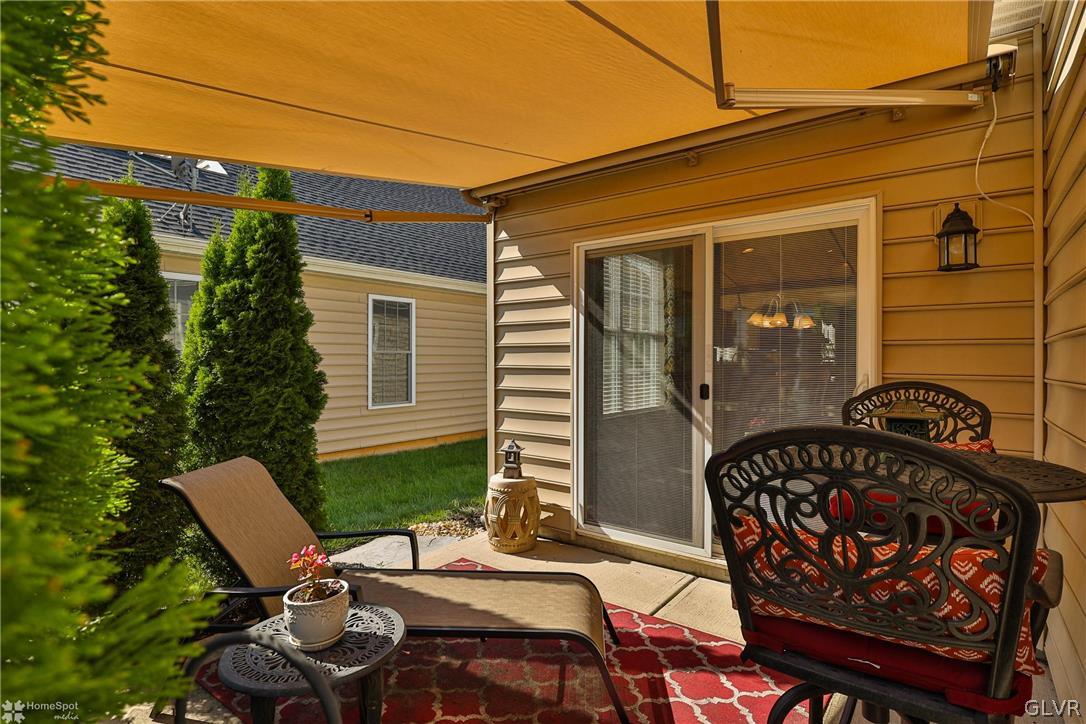 1015 Declaration Drive Bethlehem, PA 18017 - Photo 27 of 33 a view of a patio with chairs and table in a patio