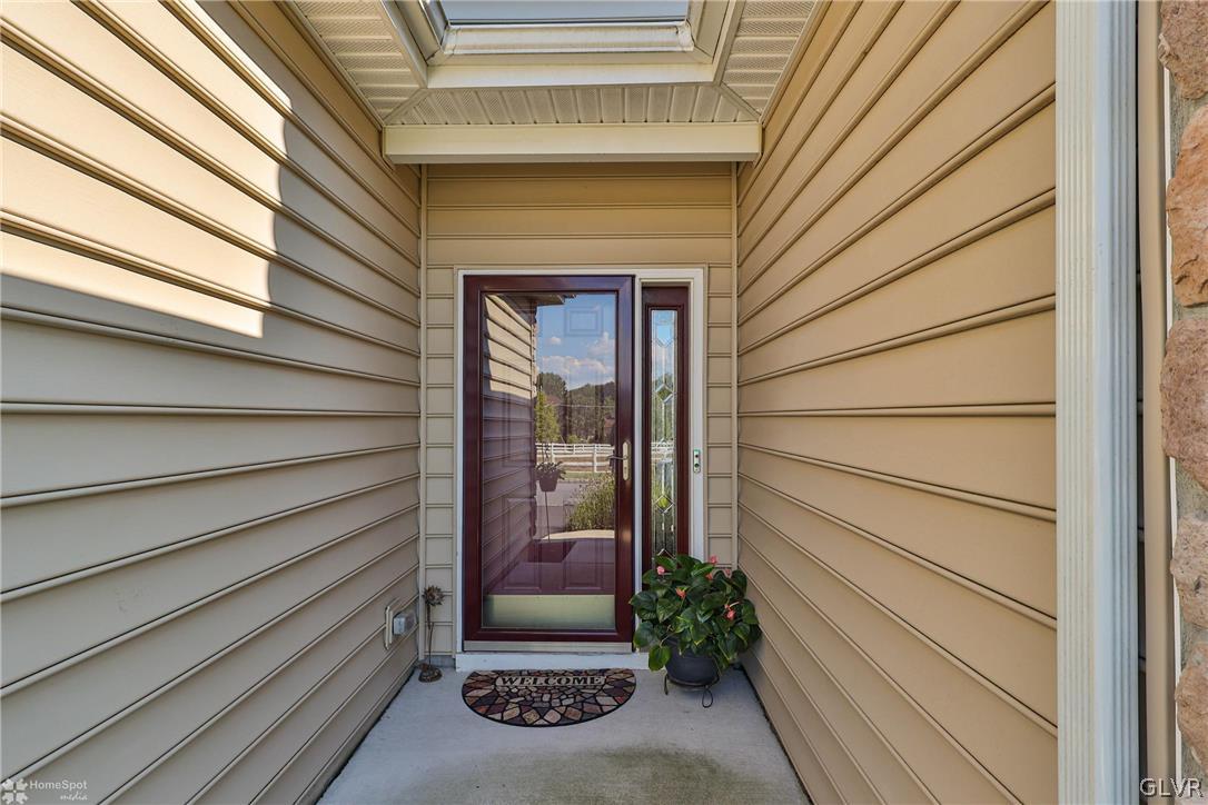 1015 Declaration Drive Bethlehem, PA 18017 - Photo 3 of 33 a yellow house with outdoor space