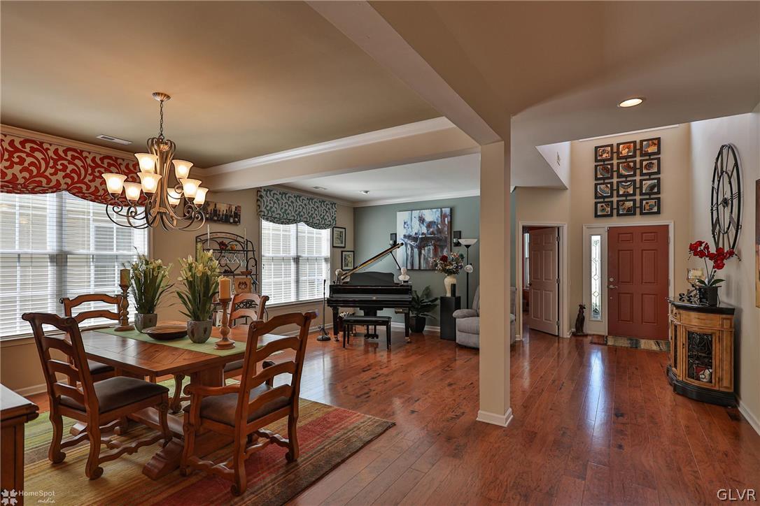1015 Declaration Drive Bethlehem, PA 18017 - Photo 10 of 33 a view of a dining room with furniture wooden floor and chandelier
