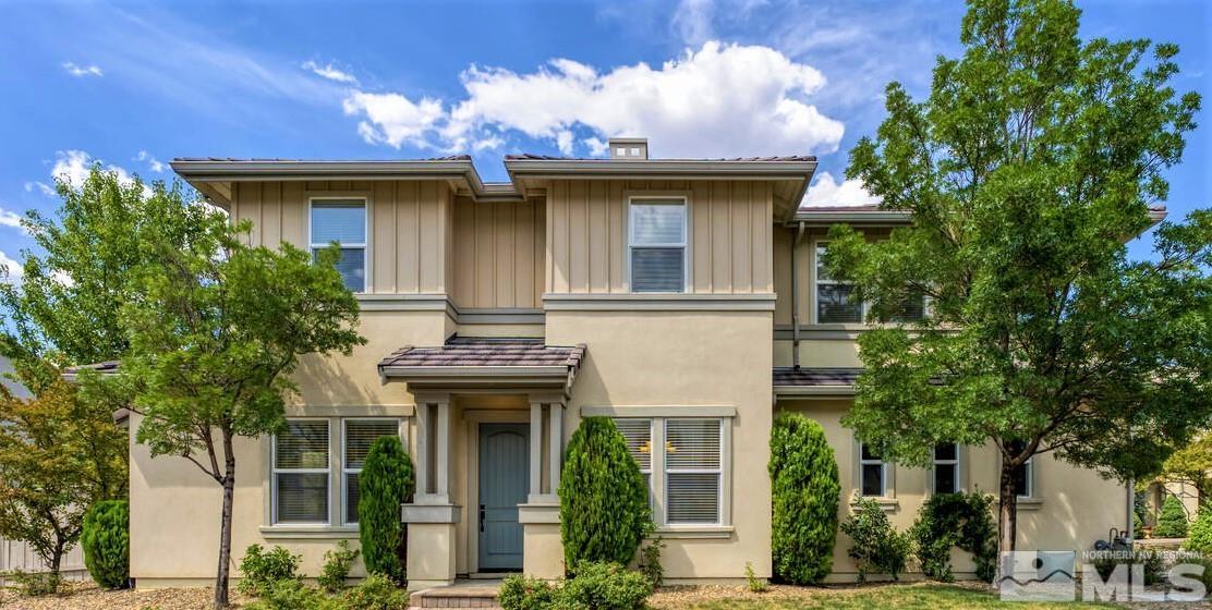 7625 Stone Bluff Way Reno, NV 89523 - Photo 1 of 32 a view of a house with a fountain and a tree