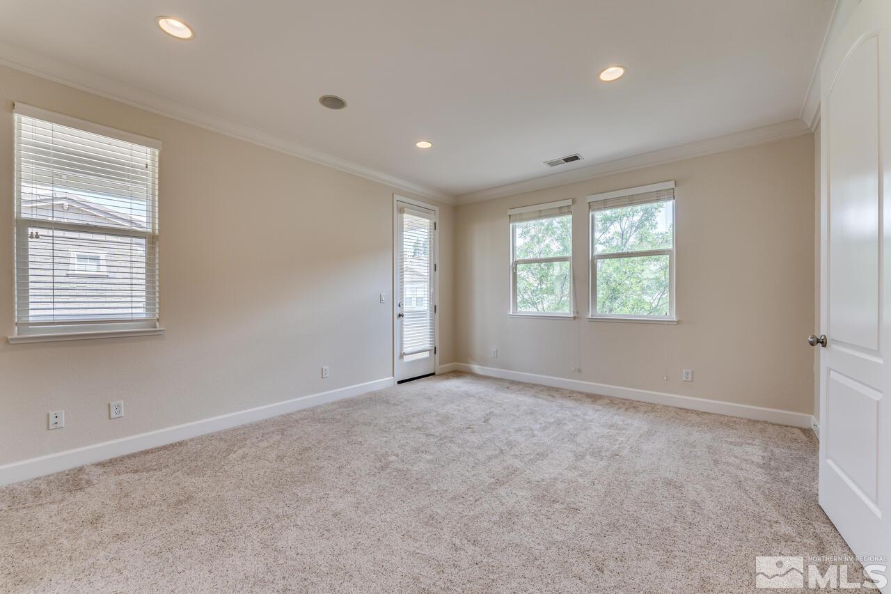 7625 Stone Bluff Way Reno, NV 89523 - Photo 19 of 32 an empty room with windows