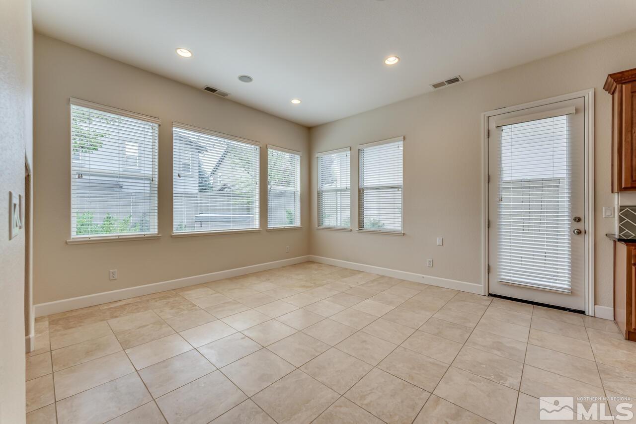7625 Stone Bluff Way Reno, NV 89523 - Photo 8 of 32 a view of an empty room with a window