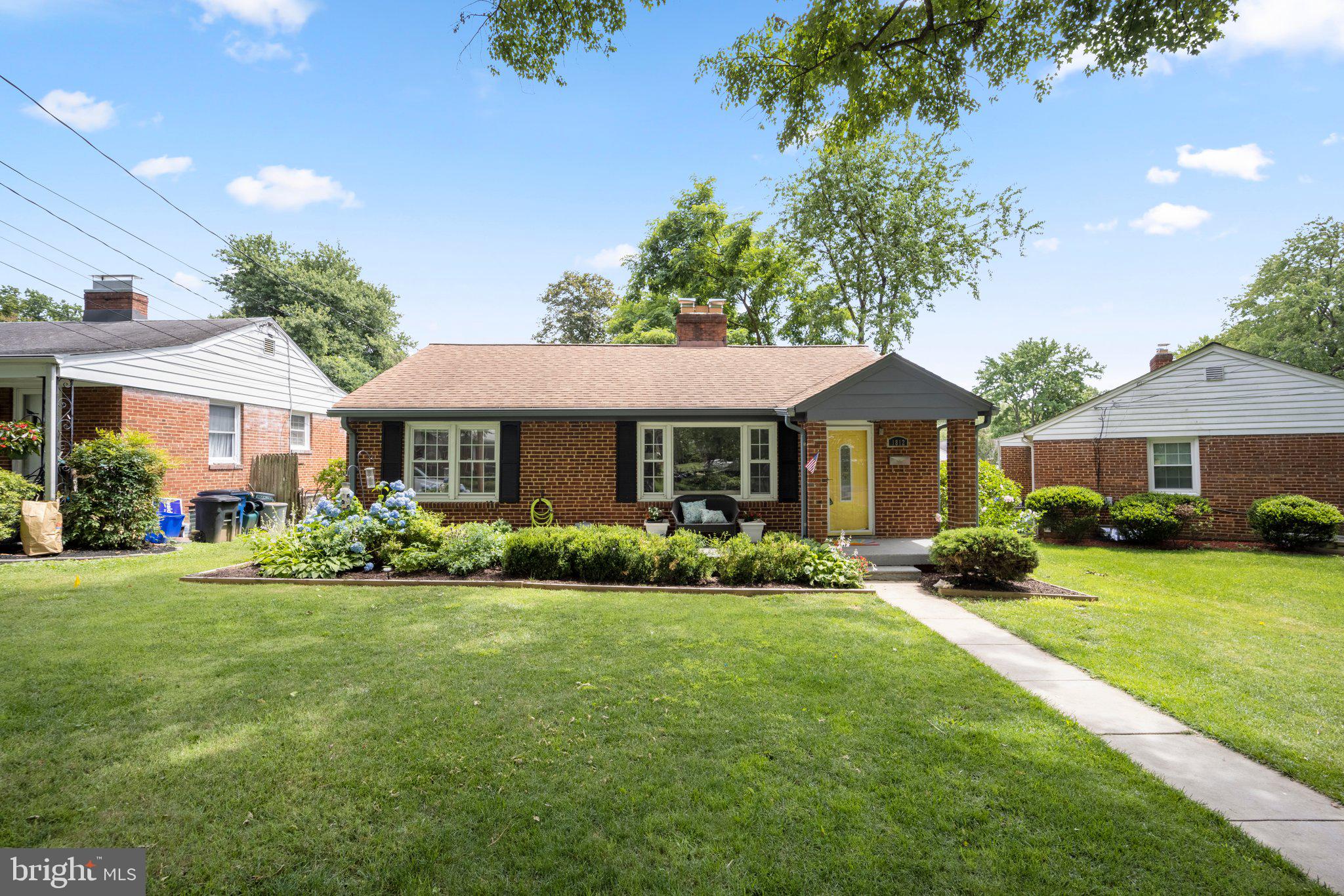 1812 Florin Street Silver Spring, MD 20902 - Photo 1 of 38 a front view of a house with a yard