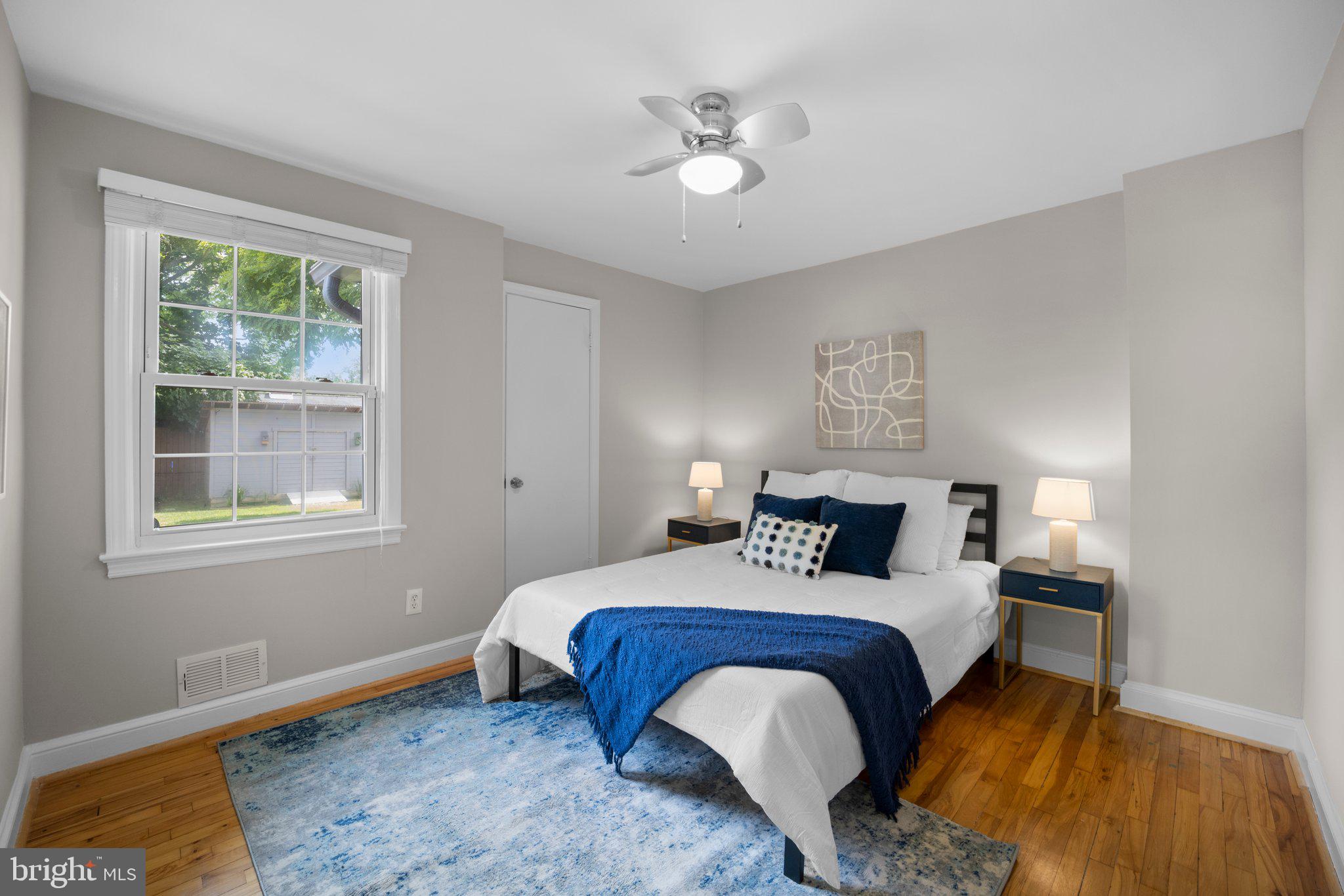 1812 Florin Street Silver Spring, MD 20902 - Photo 13 of 38 a bedroom with a bed and a window