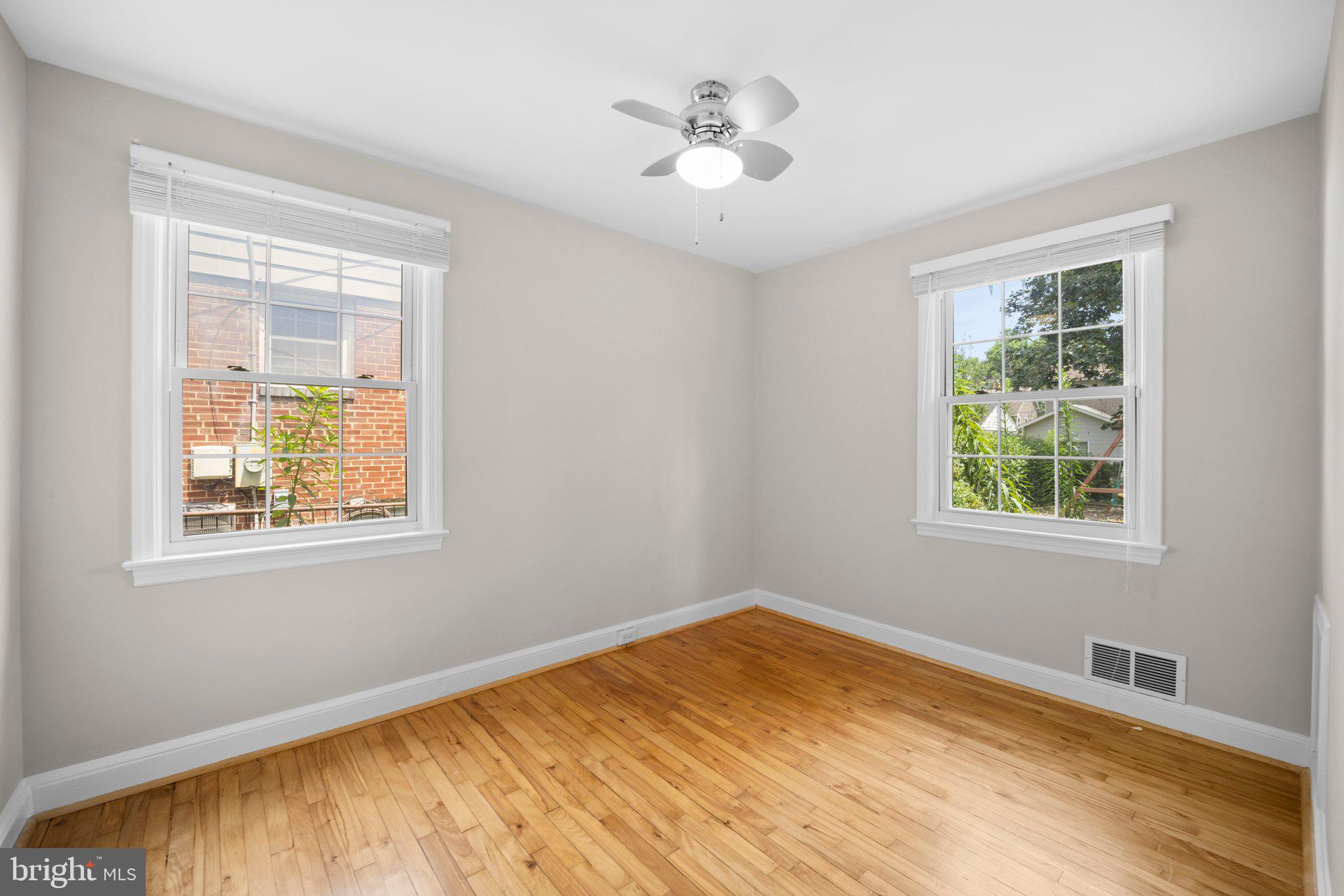 1812 Florin Street Silver Spring, MD 20902 - Photo 19 of 38 a view of an empty room with a window