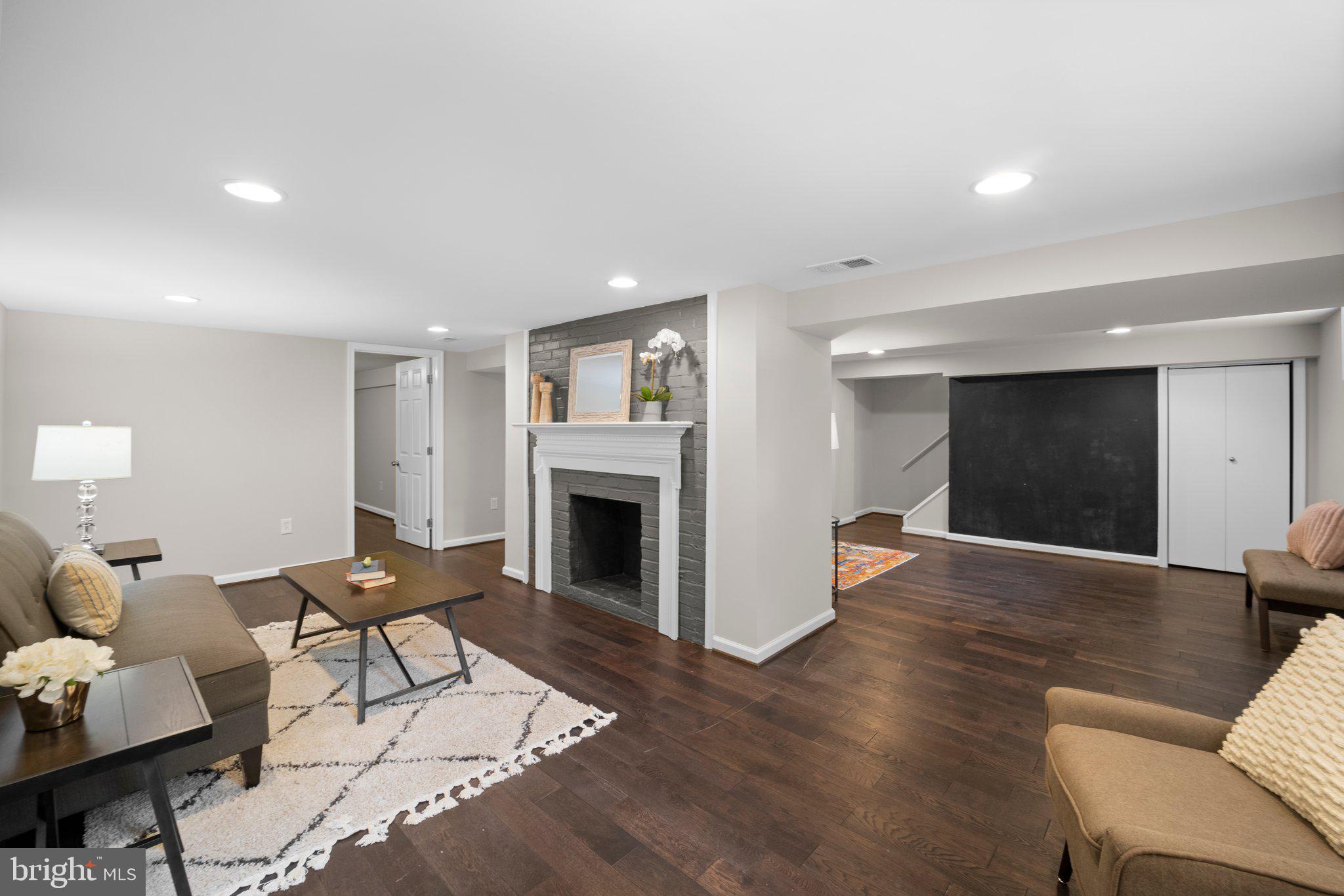 1812 Florin Street Silver Spring, MD 20902 - Photo 26 of 38 a living room with furniture and a fireplace