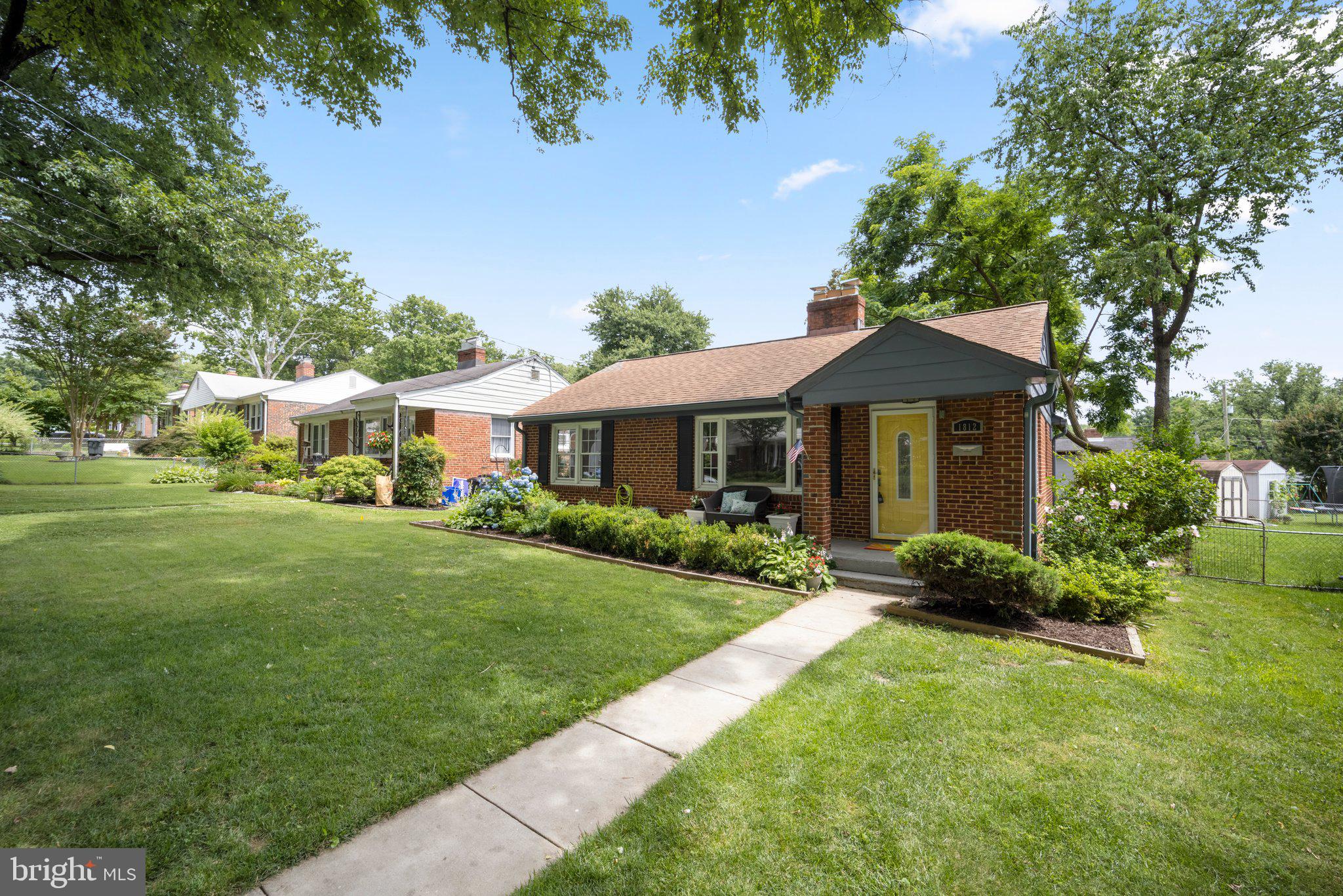 1812 Florin Street Silver Spring, MD 20902 - Photo 3 of 38 a front view of a house with garden
