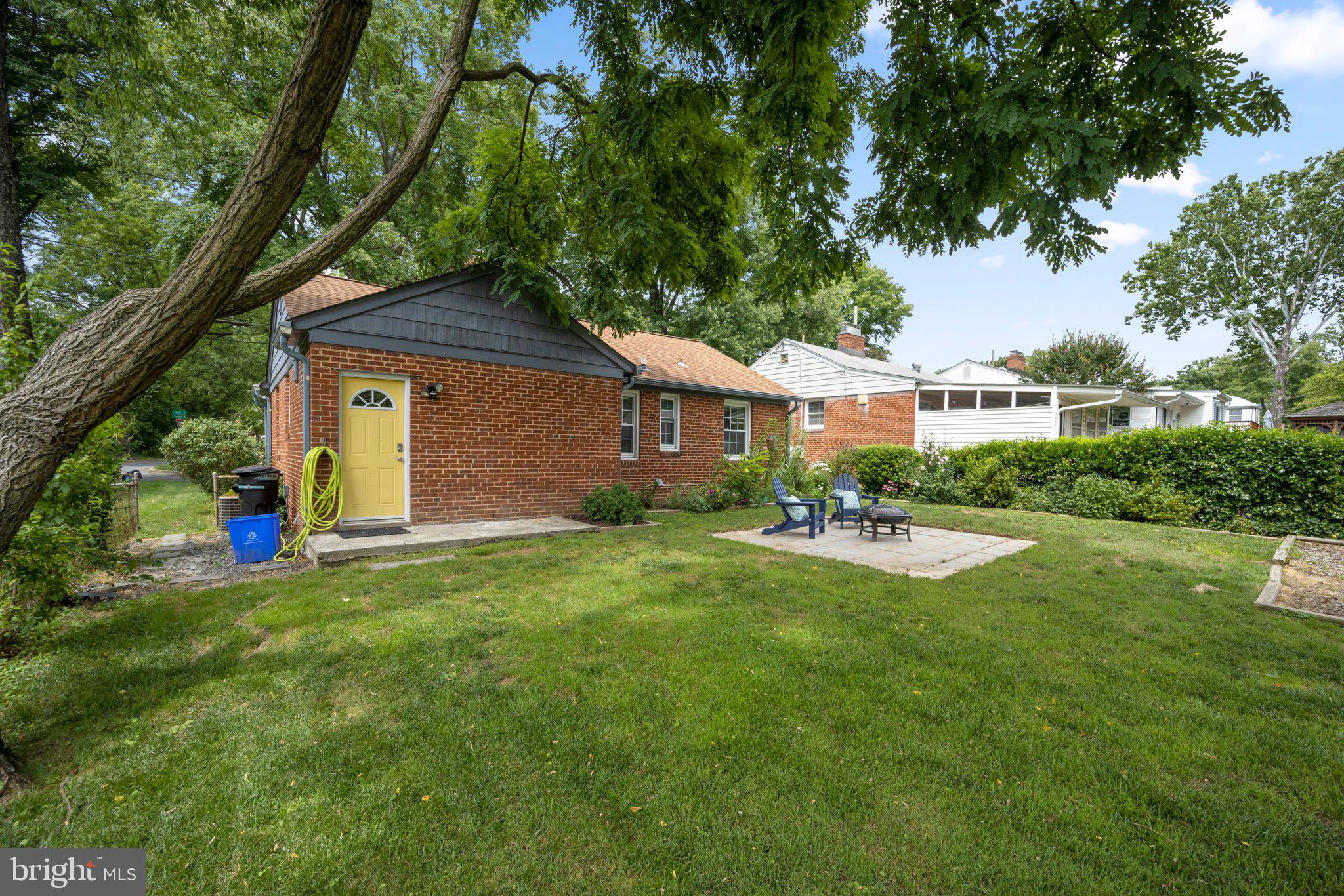1812 Florin Street Silver Spring, MD 20902 - Photo 33 of 38 a view of a house with a yard and sitting area
