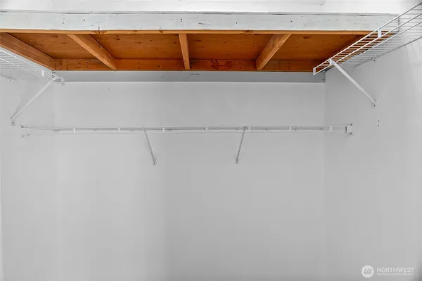 a view of a room with racks on the wall