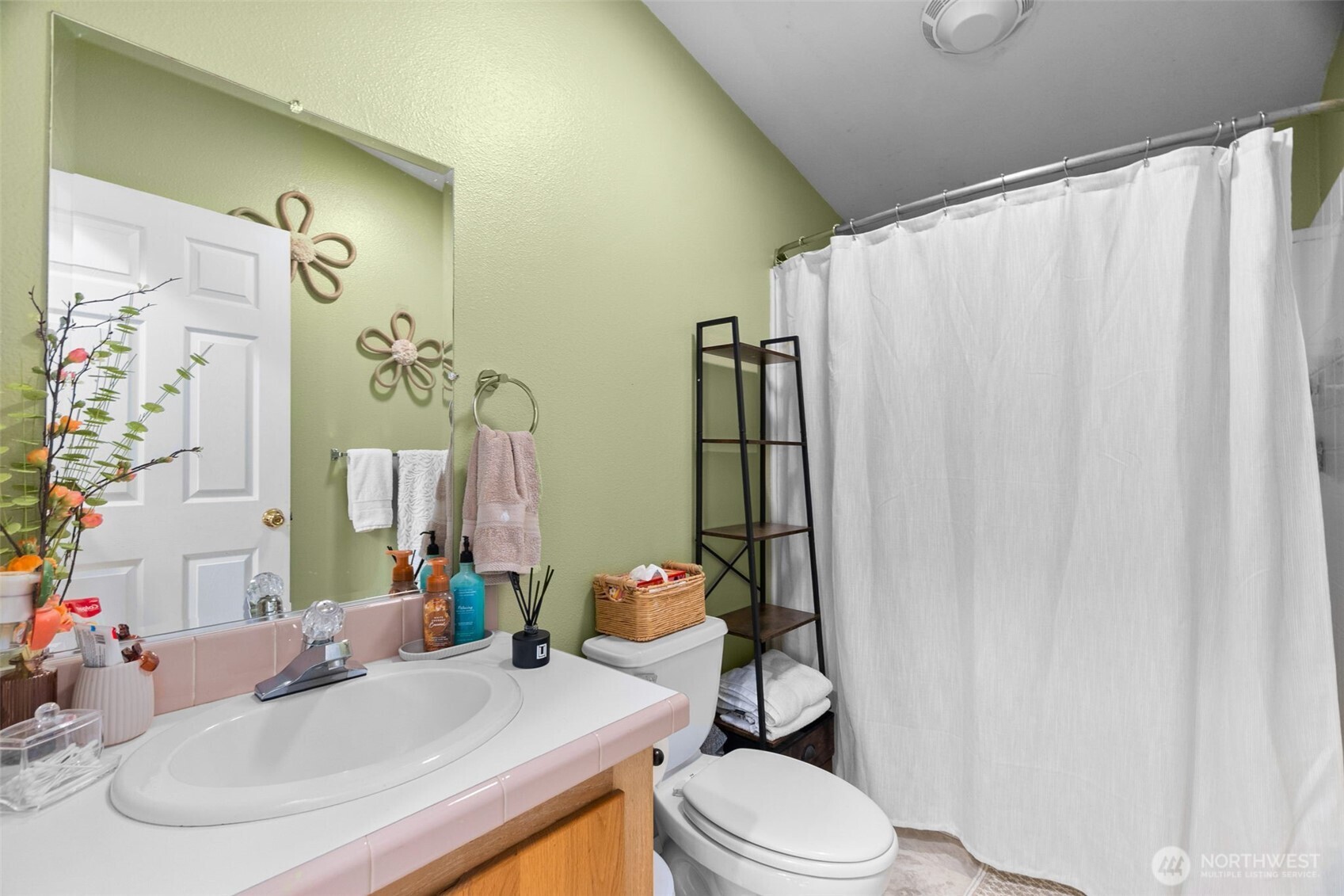 7808 197th Avenue Southwest Rochester, WA 98579 - Photo 22 of 37 a bathroom with a sink toilet and shower