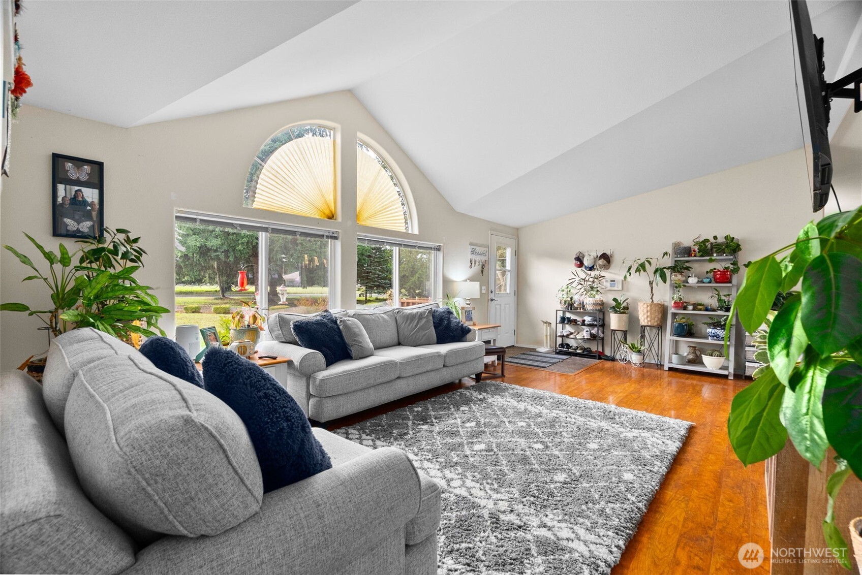 7808 197th Avenue Southwest Rochester, WA 98579 - Photo 4 of 37 a living room with furniture and a large window