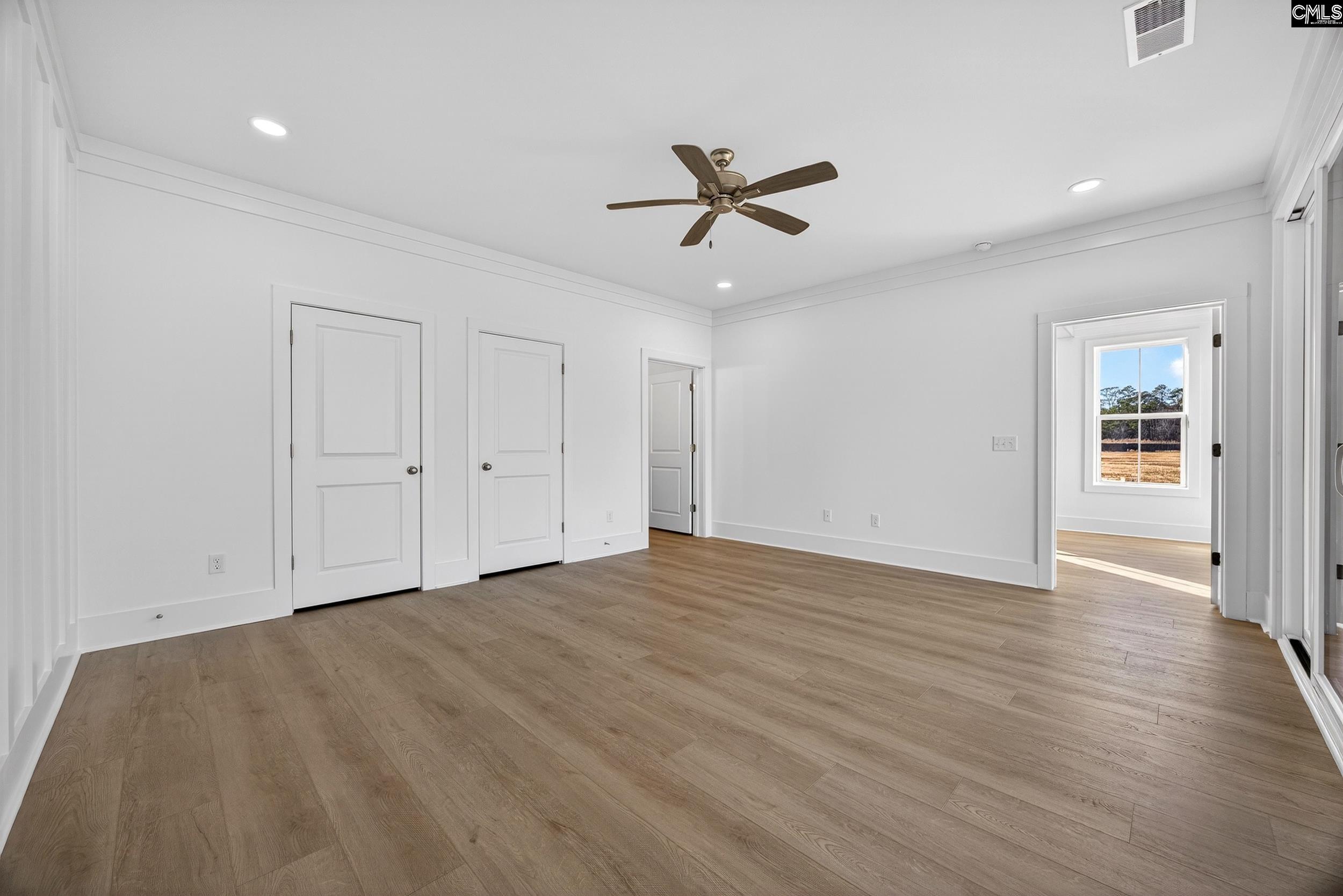 1318 Long Grove Way Lexington, SC 29072 - Photo 66 of 90 a view of empty room with wooden floor