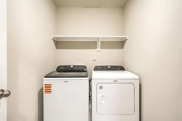 a view of a room with racks on the wall
