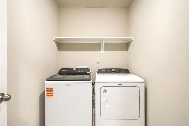 a view of a room with racks on the wall