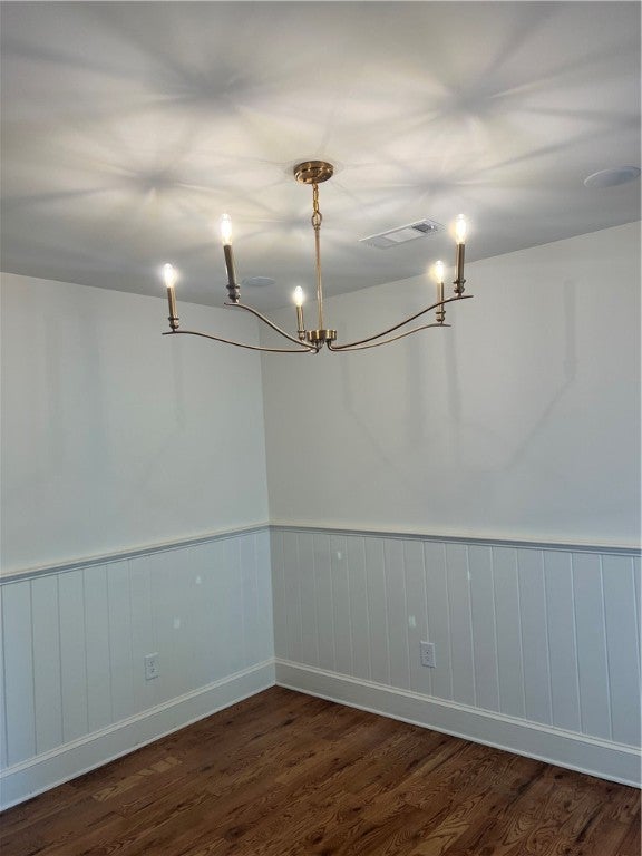 1302 Rocky Brook Road Opelika, AL 36801 - Photo 18 of 37 Dining area with beautiful lighting and judges paneling with chair rail completely around the room, deep trim baseboards