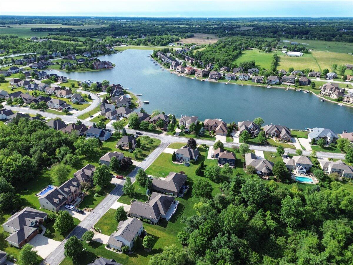 8751 Bridgewater Court Crown Point, IN 46307 - Photo 49 of 49 an aerial view of a houses with a lake view