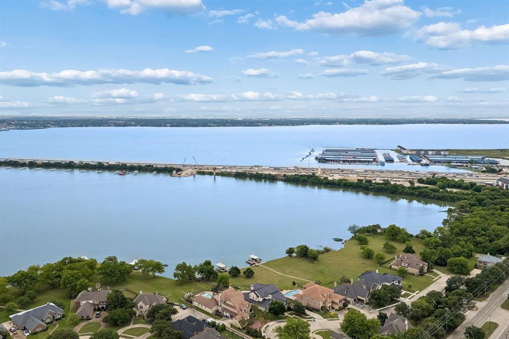 8517 Navigation Drive Rowlett, TX 75088 - Photo 4 of 39 a view of a lake with houses