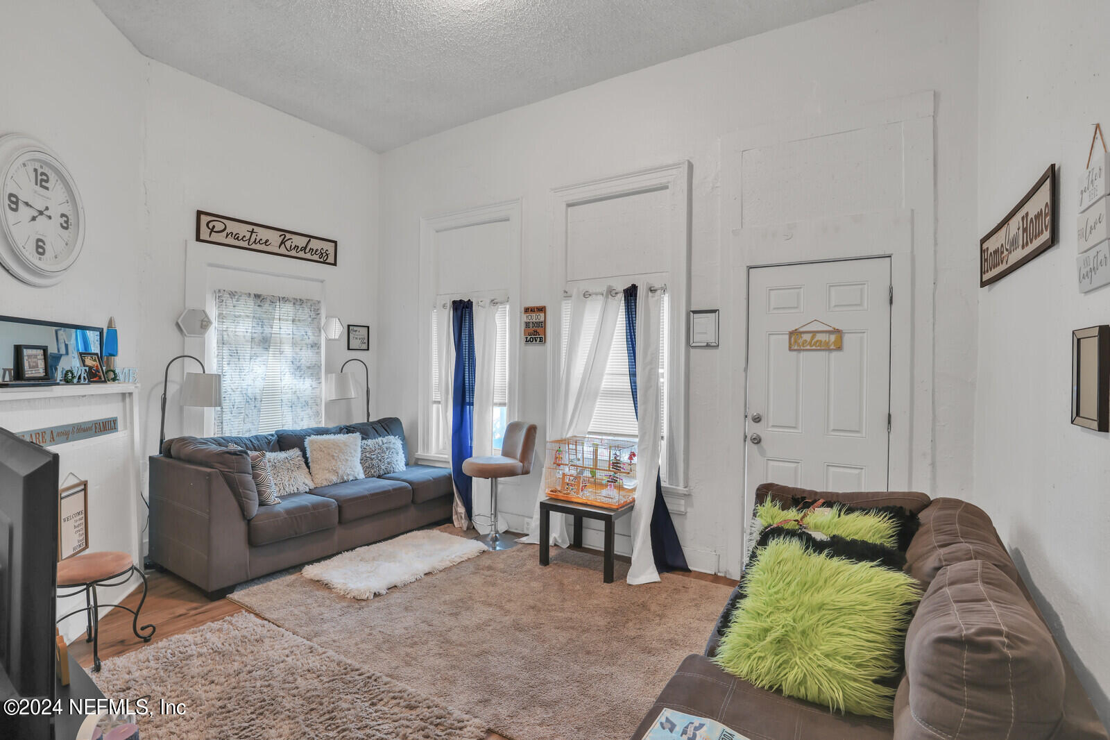 2306 Moncrief Road Jacksonville, FL 32209 - Photo 10 of 14 a living room with furniture and a large window