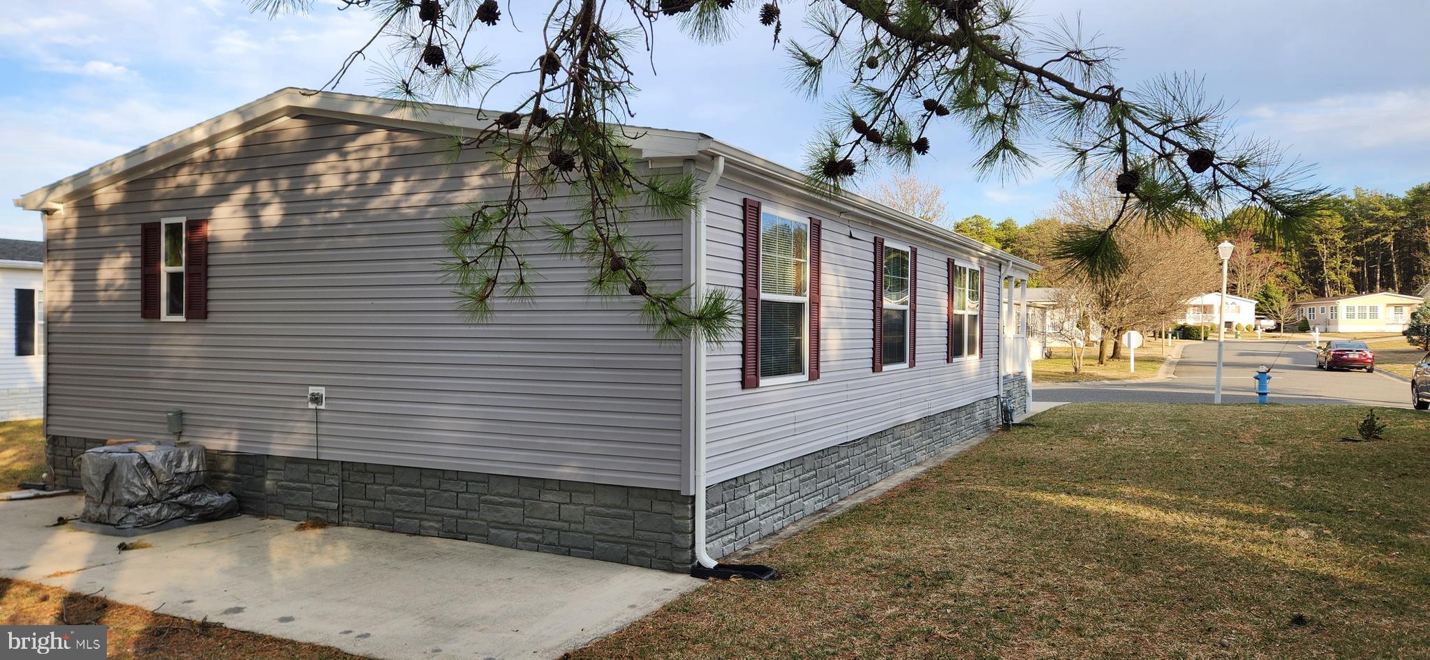 77 Pine Ridge Boulevard Whiting, NJ 08759 - Photo 13 of 49 a view of a house with a yard