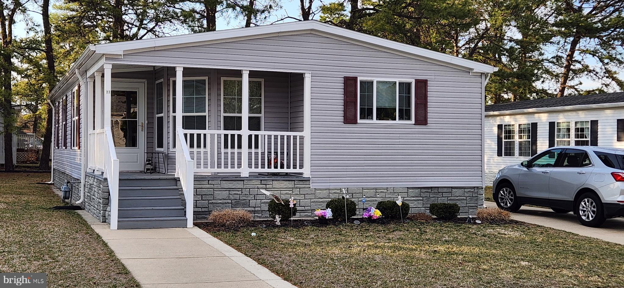 77 Pine Ridge Boulevard Whiting, NJ 08759 - Photo 20 of 49 a view of a house with a patio
