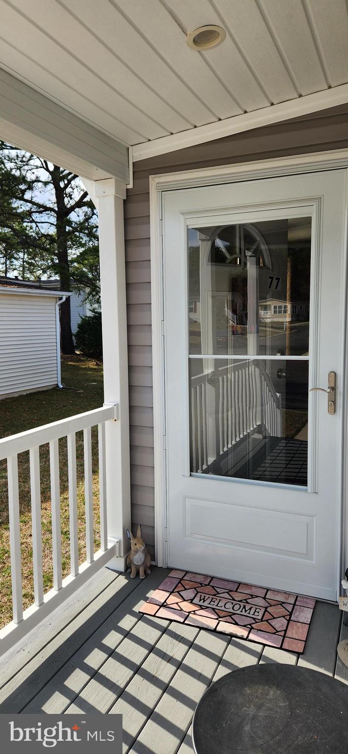 77 Pine Ridge Boulevard Whiting, NJ 08759 - Photo 2 of 49 a front view of a house with a window