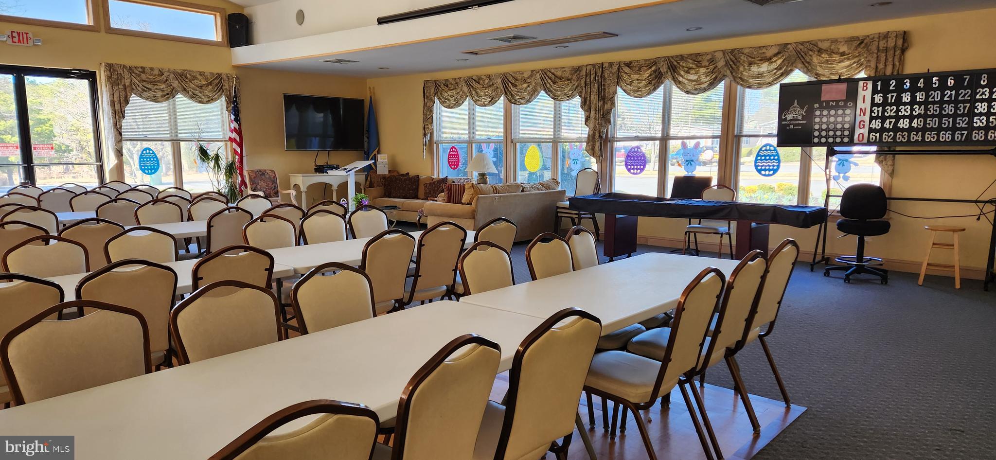 77 Pine Ridge Boulevard Whiting, NJ 08759 - Photo 31 of 49 a dining room with furniture and a floor to ceiling window
