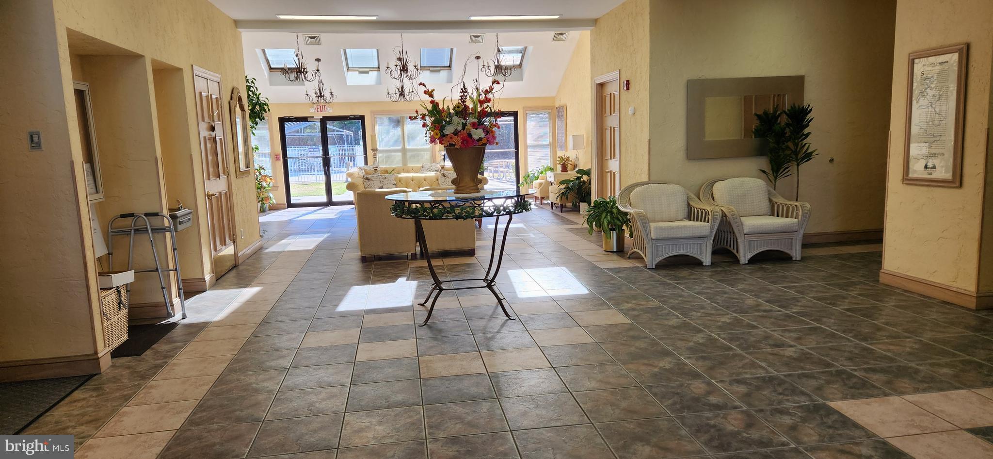 77 Pine Ridge Boulevard Whiting, NJ 08759 - Photo 34 of 49 a living room with furniture and a table
