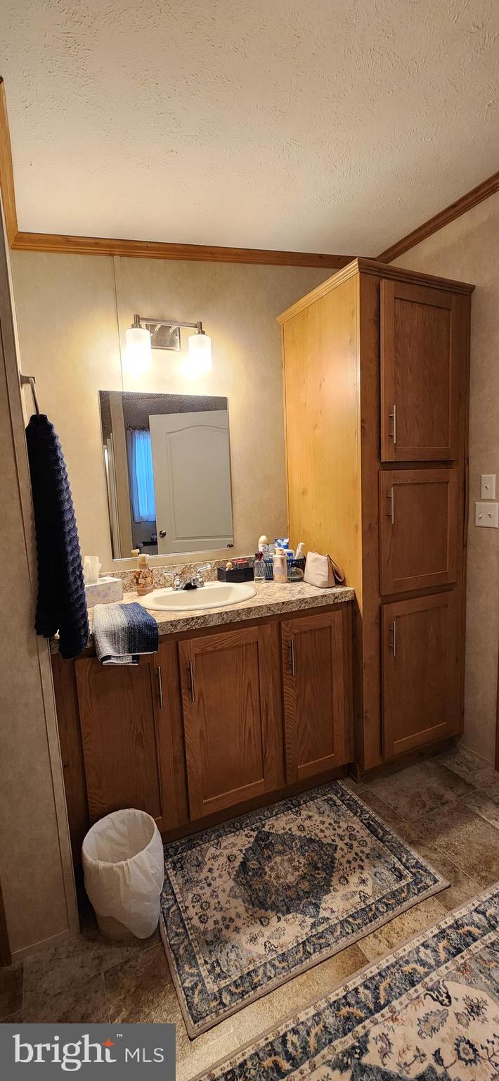 77 Pine Ridge Boulevard Whiting, NJ 08759 - Photo 42 of 49 a living room with a toilet