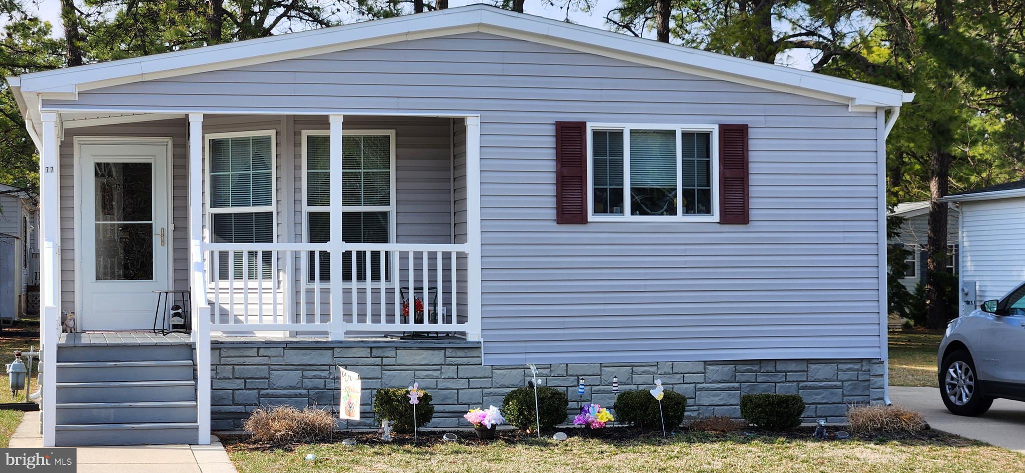 77 Pine Ridge Boulevard Whiting, NJ 08759 - Photo 46 of 49 a view of a house with a window and many windows