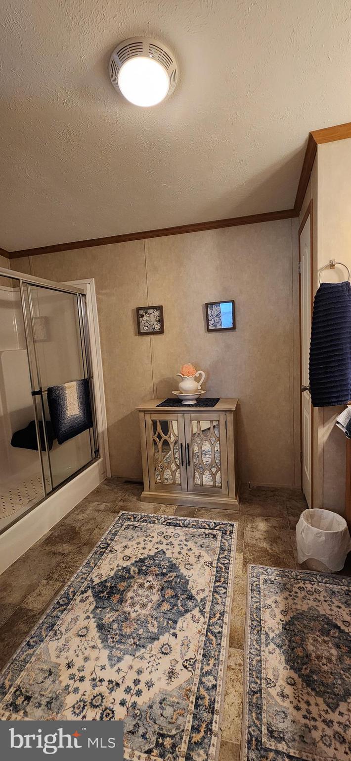 77 Pine Ridge Boulevard Whiting, NJ 08759 - Photo 9 of 49 a living room with a couch