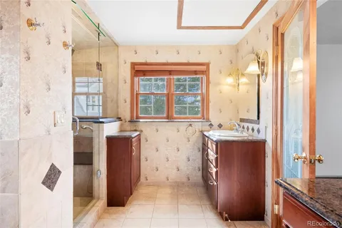 a view of walk in closet and window