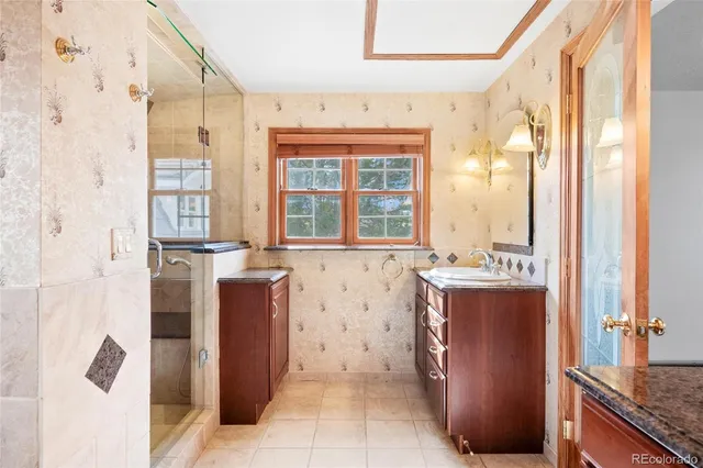 a view of walk in closet and window