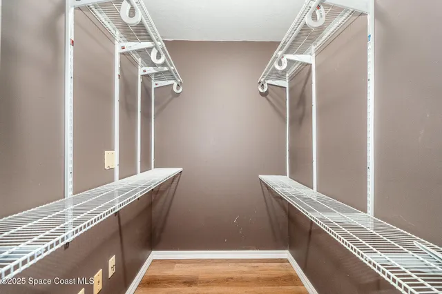 a view of an empty walk in closet
