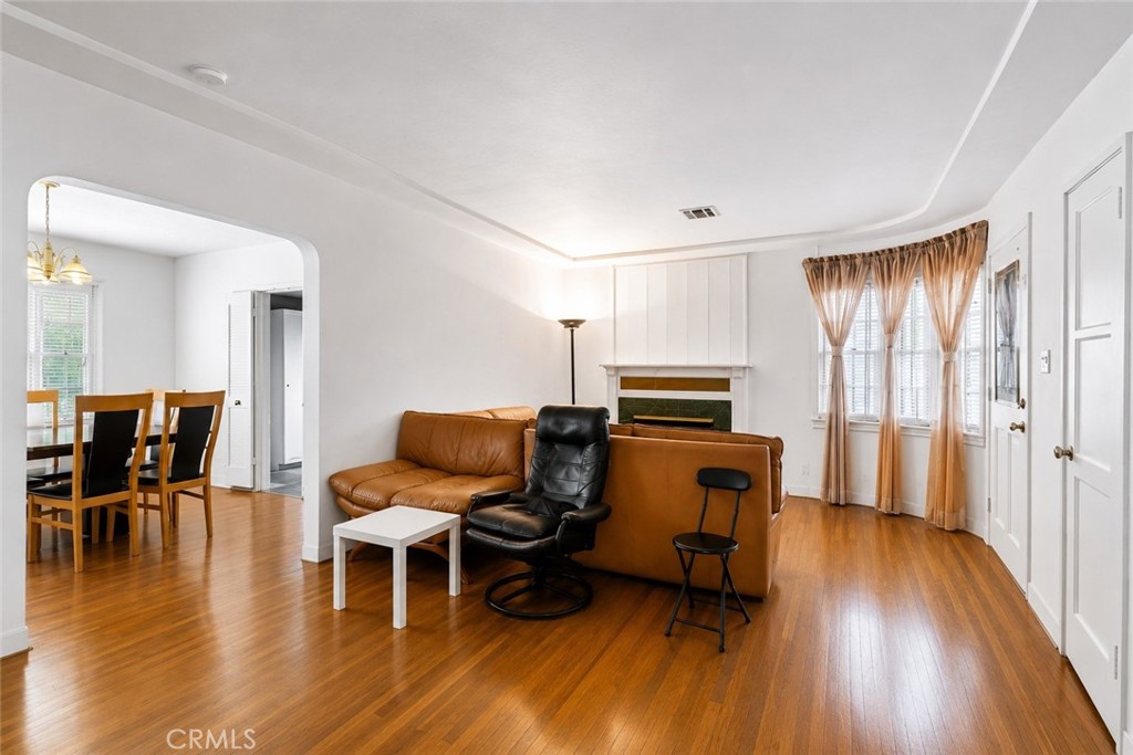 2209 Queensberry Road Pasadena, CA 91104 - Photo 9 of 44 a living room with furniture and a wooden floor