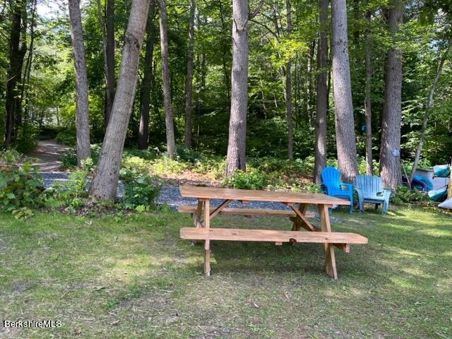 0 Goose Pond Road Lee, MA 01264 - Photo 3 of 10 a white bench sitting in the middle of a park