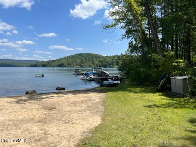 0 Goose Pond Road Lee, MA 01264 - Photo 10 of 10 a view of a lake with houses in the back