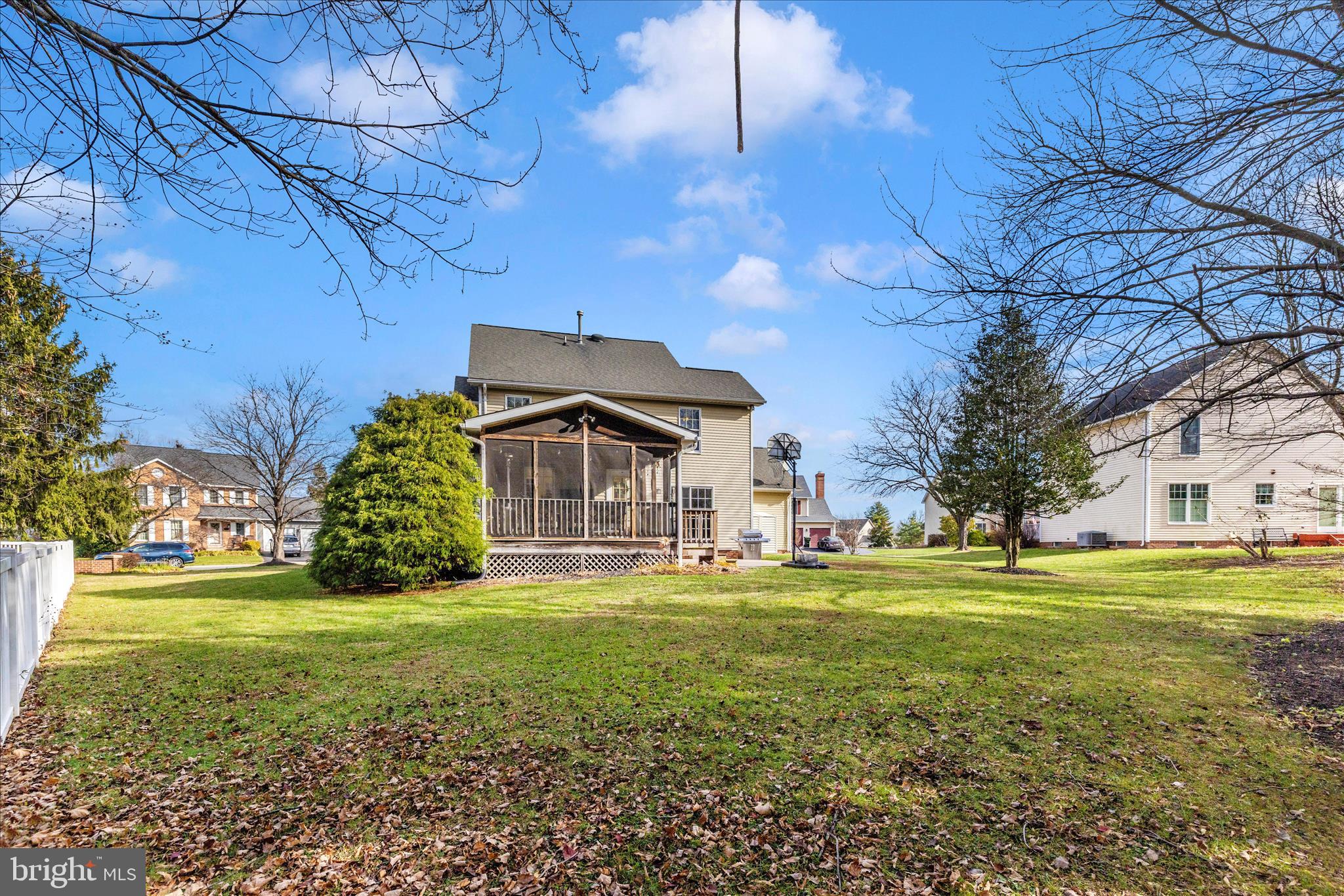 2181 East Greenleaf Drive Frederick, MD 21702 - Photo 44 of 55 a view of a big room with large trees and a big yard