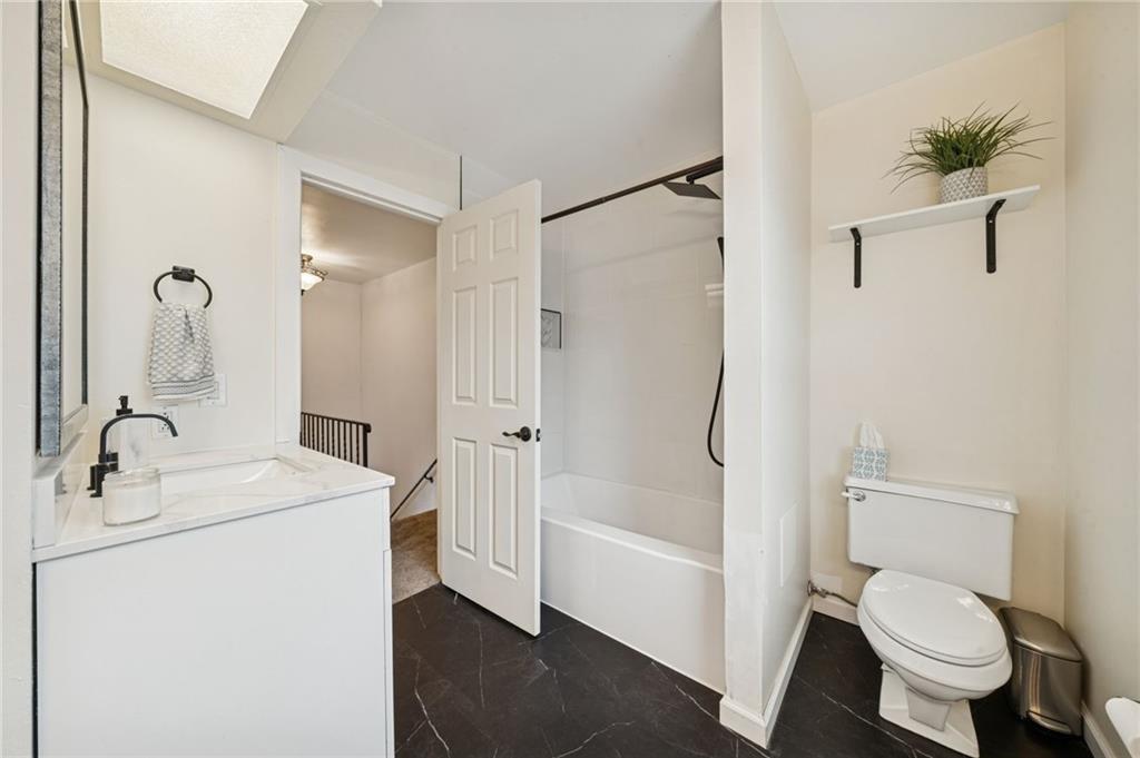 206 Falls Village Road Pittsburgh, PA 15239 - Photo 18 of 38 a bathroom with a sink toilet and shower