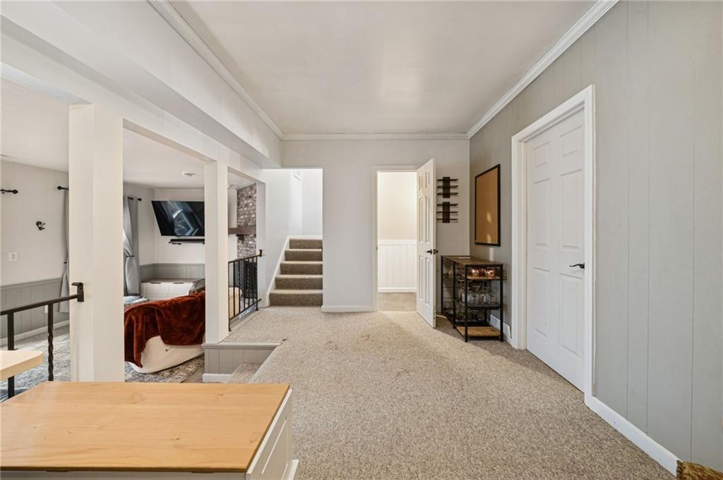 206 Falls Village Road Pittsburgh, PA 15239 - Photo 29 of 38 a living room with furniture and a flat screen tv