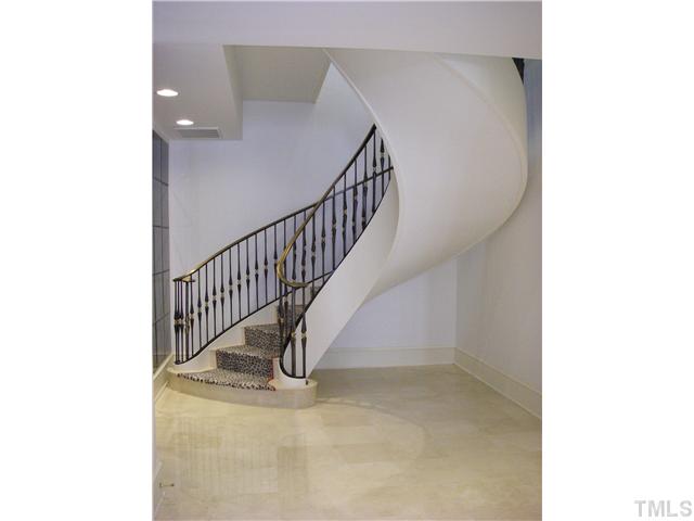 2904 Fairview Road Raleigh, NC 27608 - Photo 24 of 25 a view of a hallway with staircase