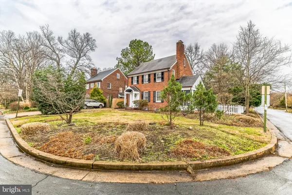 a view of a house with swimming pool