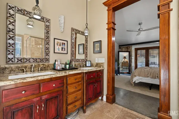 a front view of a house with yard and sitting area