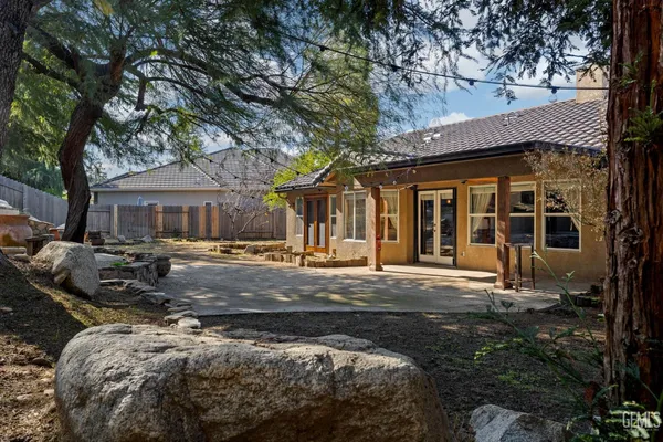 a kitchen with sink and cabinets